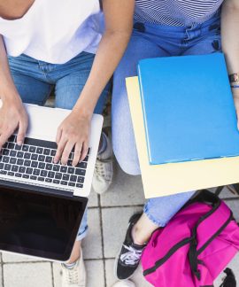 crop-women-studying-street